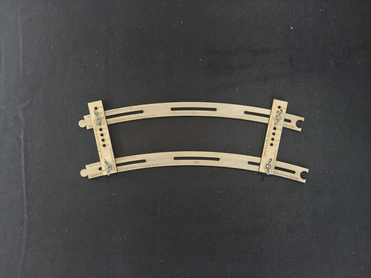 Curved Rail-Flow Track Alignment Guides