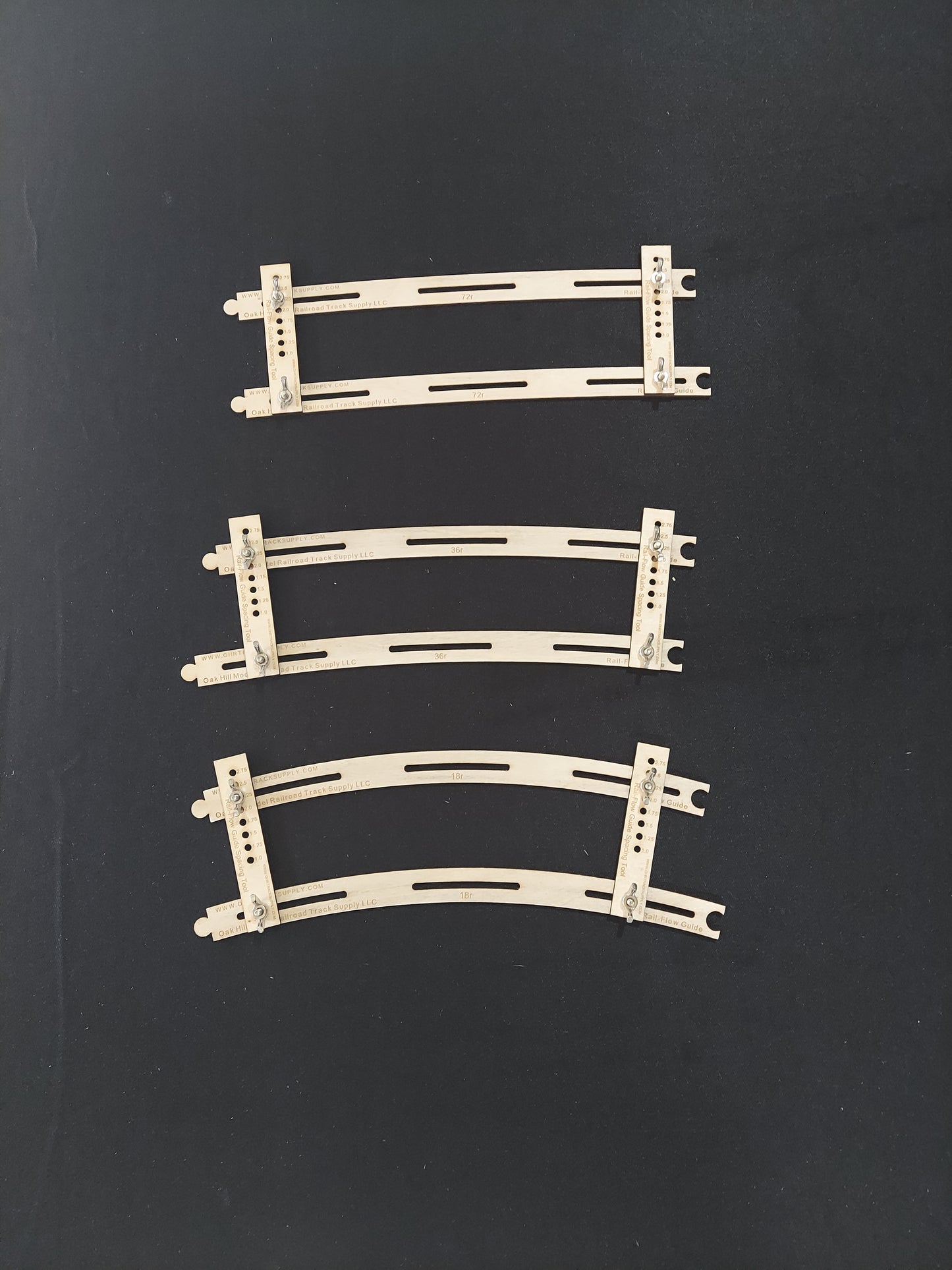 Curved Rail-Flow Track Alignment Guides
