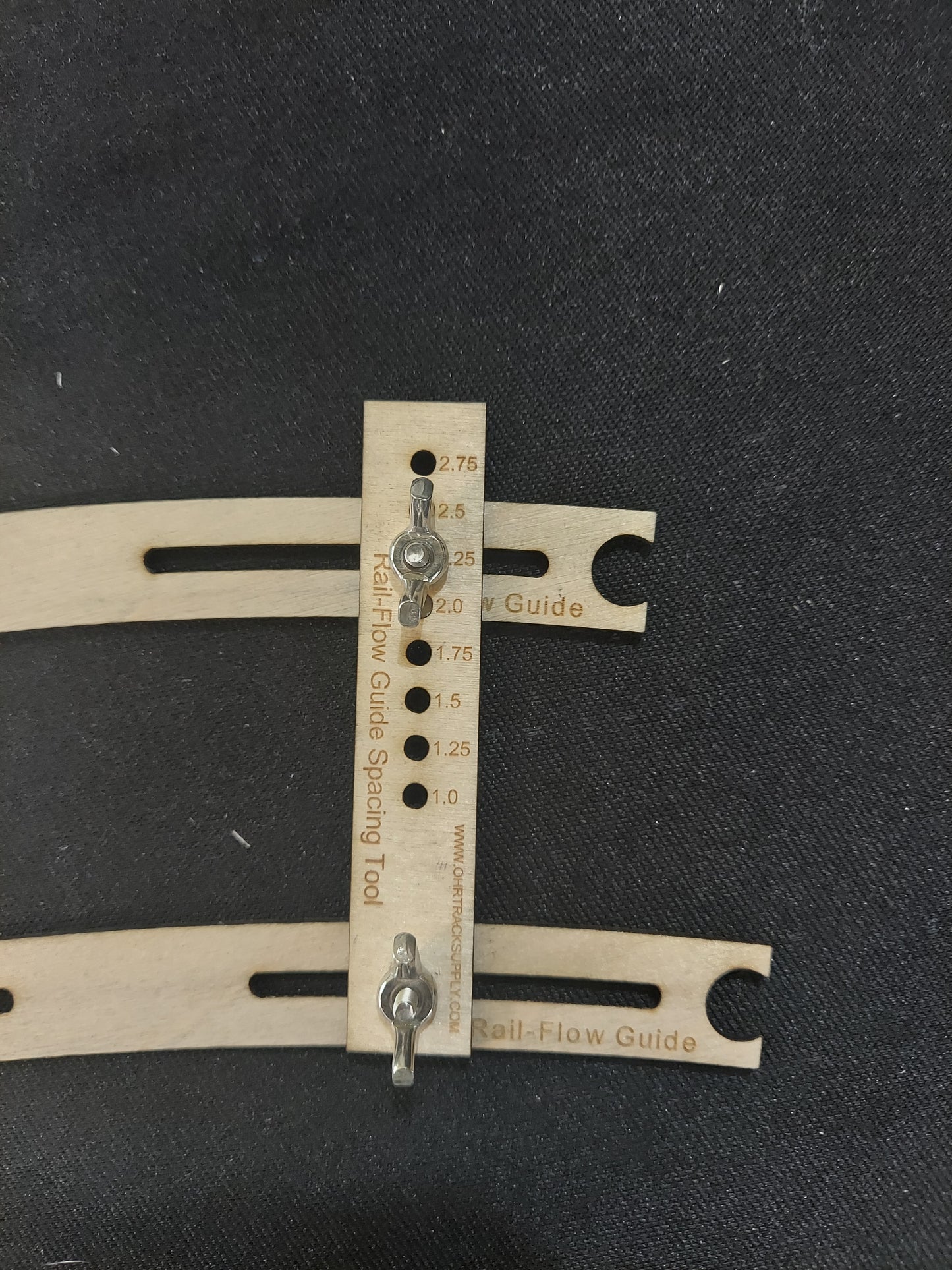 Curved Rail-Flow Track Alignment Guides